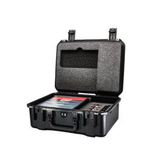 Open hard-shell protective case with foam inserts and a small booklet inside, showing compartments for tools or accessories.